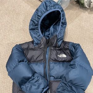 Boys blue reversible north face